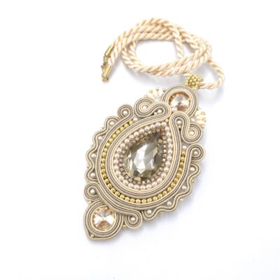 Wisiorek sutasz naszyjnik beżowo złoty wieczorowy z kryształami "Goldea"